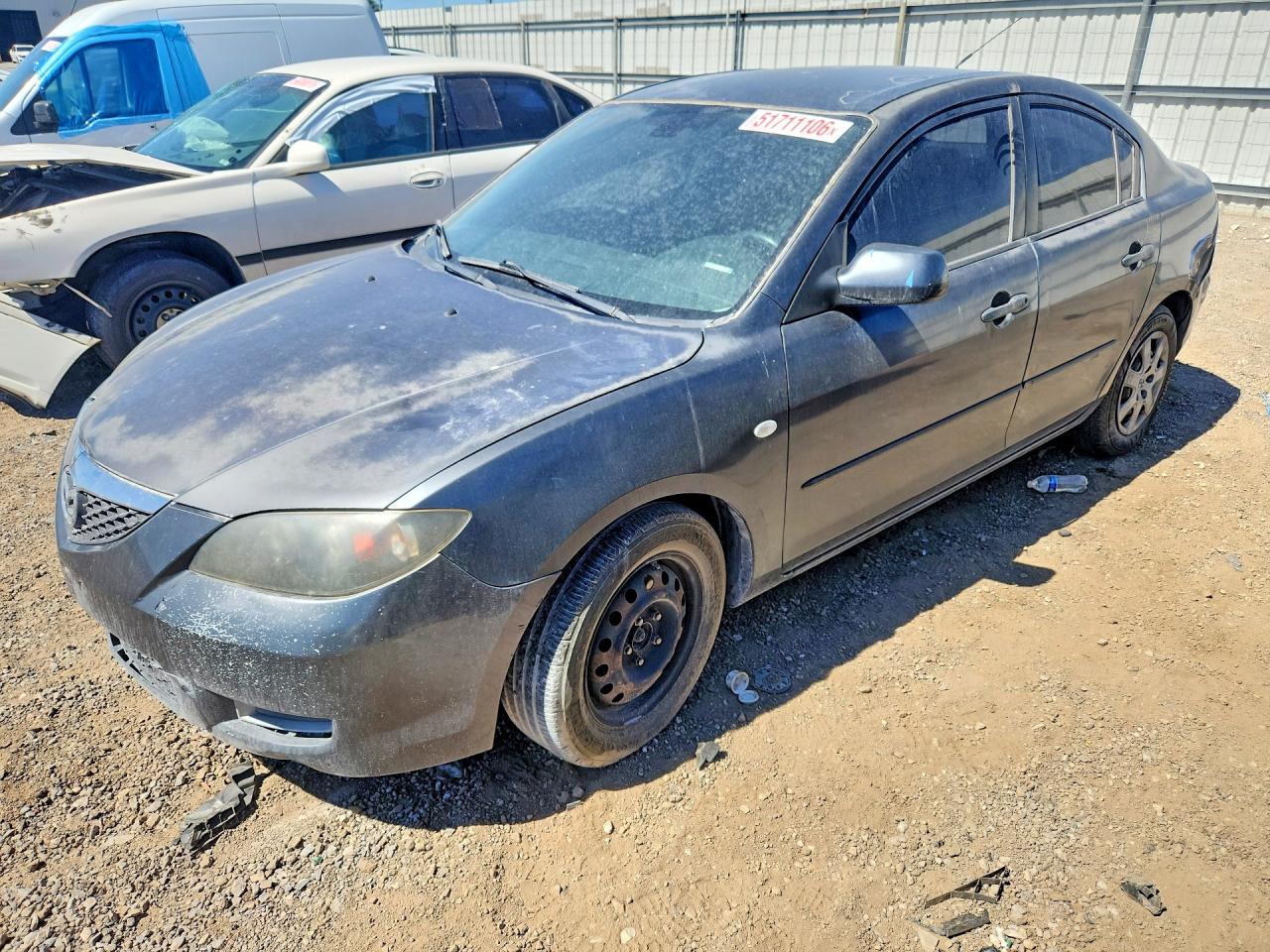 2009 Mazda 3 i Touring Value, VIN JM1BK32G791257470 — Burn