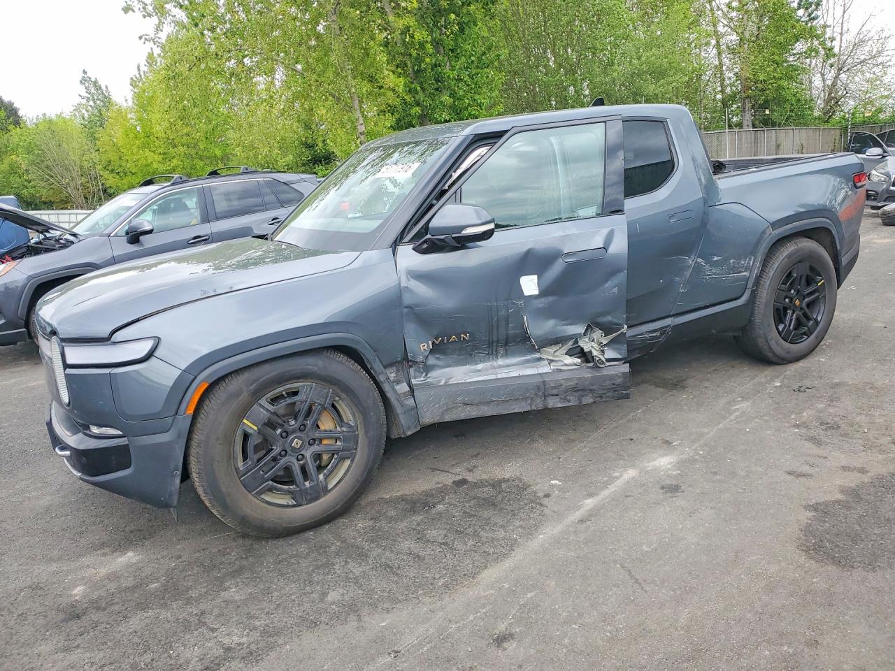 2022 Rivian R1T Adventure, VIN 7FCTGAAA8NN015906 — Бок