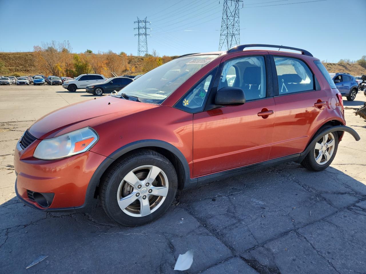 2011 Suzuki SX4 Crossover, VIN JS2YB5A33B6303699 — Зад