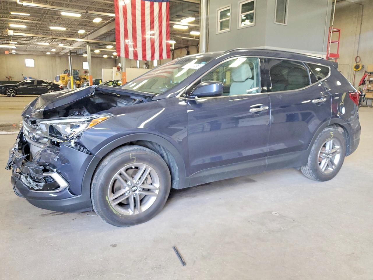 2017 Hyundai Santa Fe 2.4L, VIN 5NMZUDLB3HH030394 — Перед