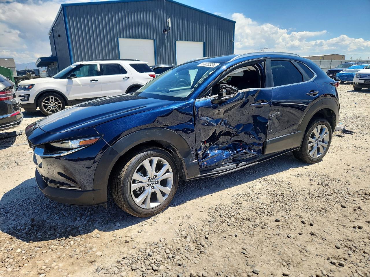 2023 Mazda CX-30 S Select, VIN 3MVDMBBM9PM514517 — Side