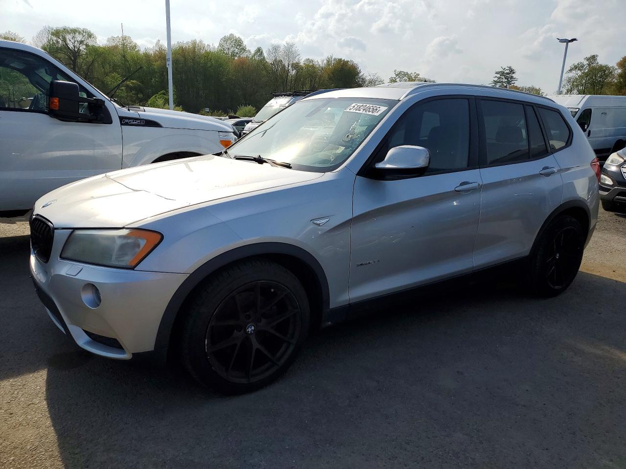 2011 BMW X3 28i, VIN 5UXWX5C59BL701923 — Minor dents and scratches
