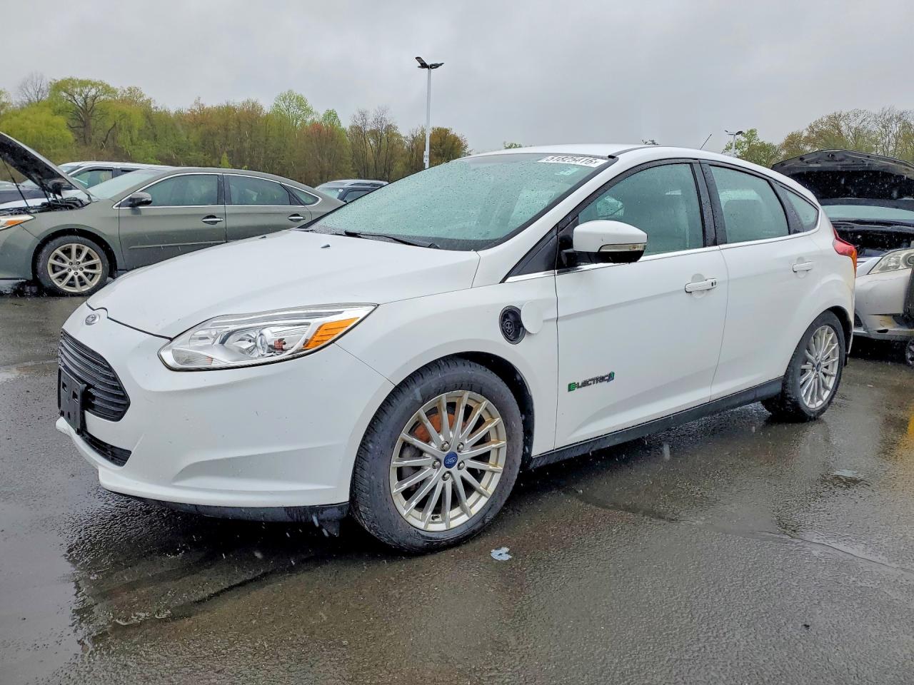 2014 Ford Focus Electric, VIN 1FADP3R49EL274121 — Minor dents and scratches
