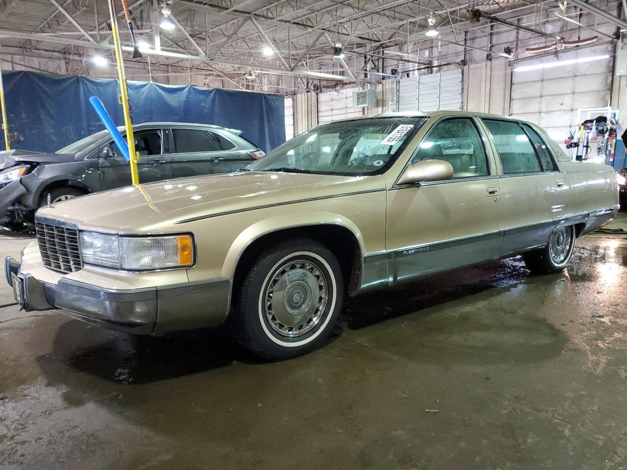 1995 Cadillac Fleetwood, VIN 1G6DW52P5SR715543 — Engine fire