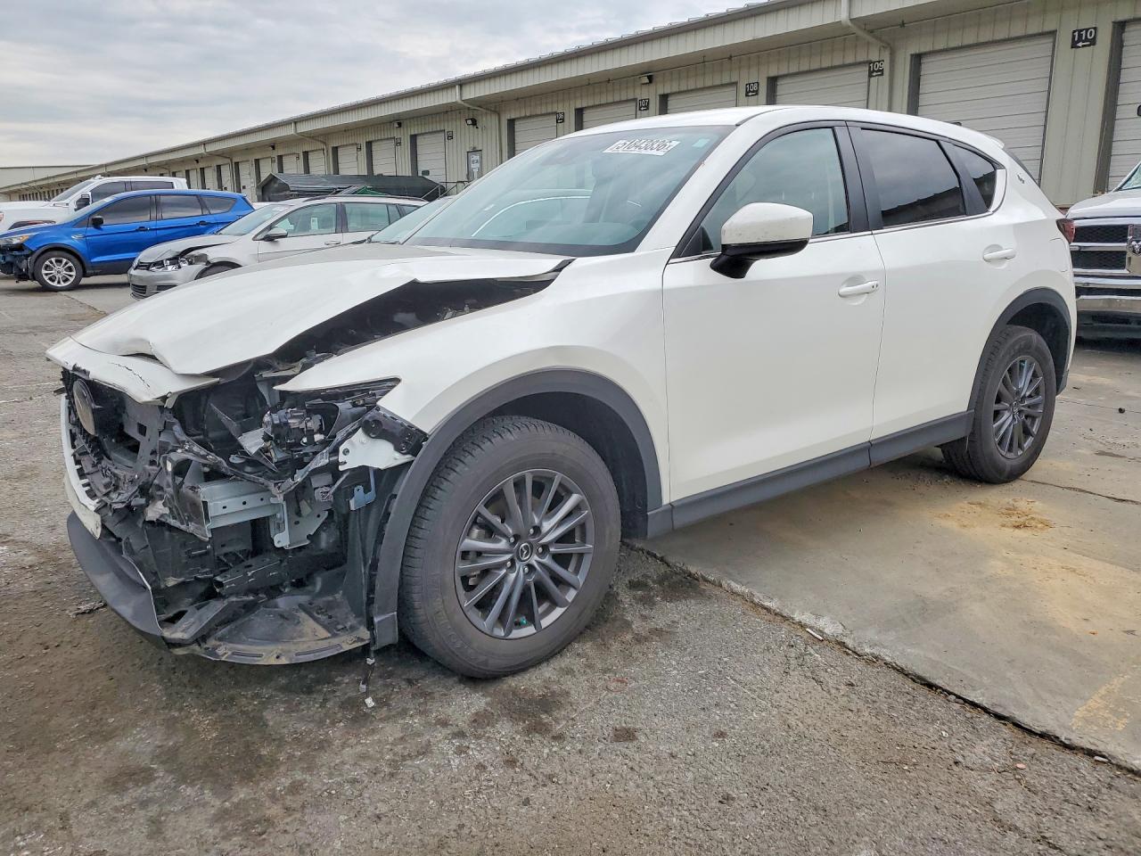 2021 Mazda CX-5 Touring, VIN JM3KFACM7M0332669 — Front end