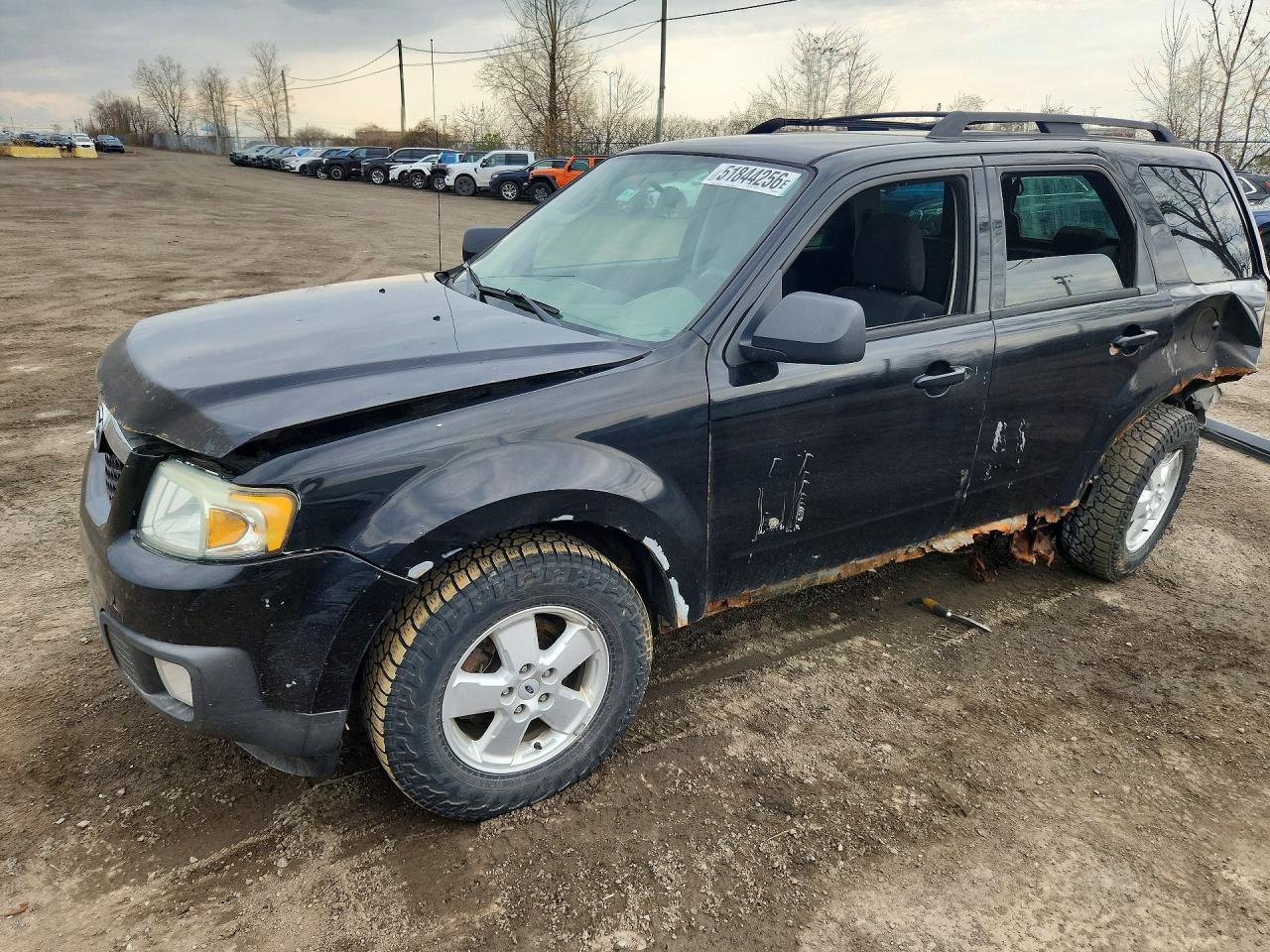 2009 Mazda Tribute Sport, VIN 4F2CZ02729KM01273 — Rear end