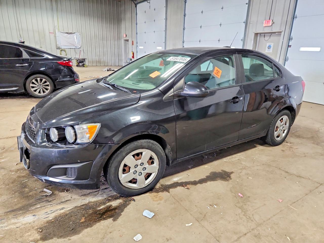 2015 Chevrolet Sonic LS, VIN 1G1JA5SH0F4159760 — Vandalism