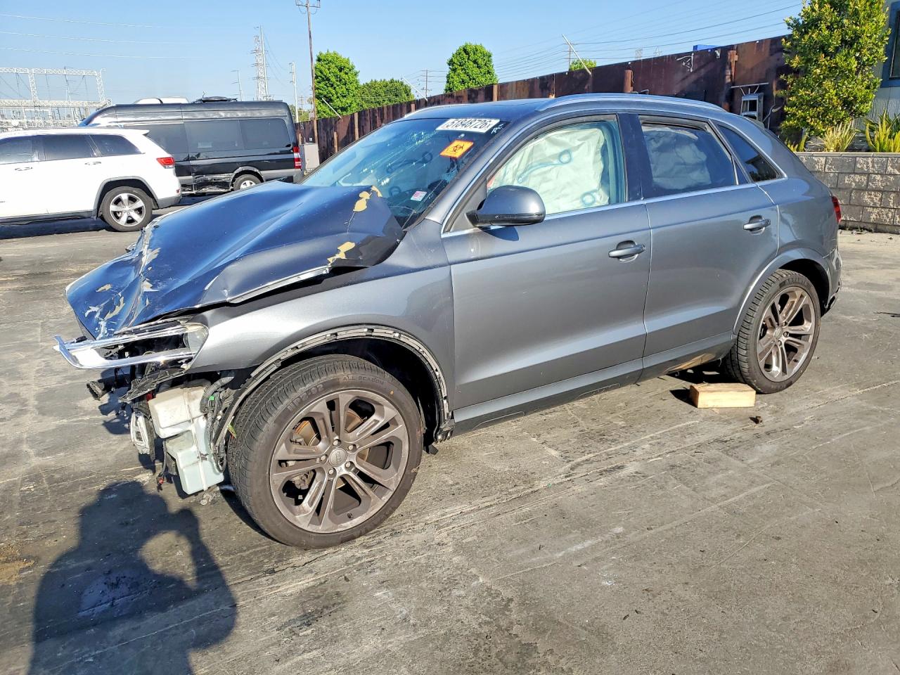 2015 Audi Q3 Premium Plus, VIN WA1EFCFS4FR002542 — Перед