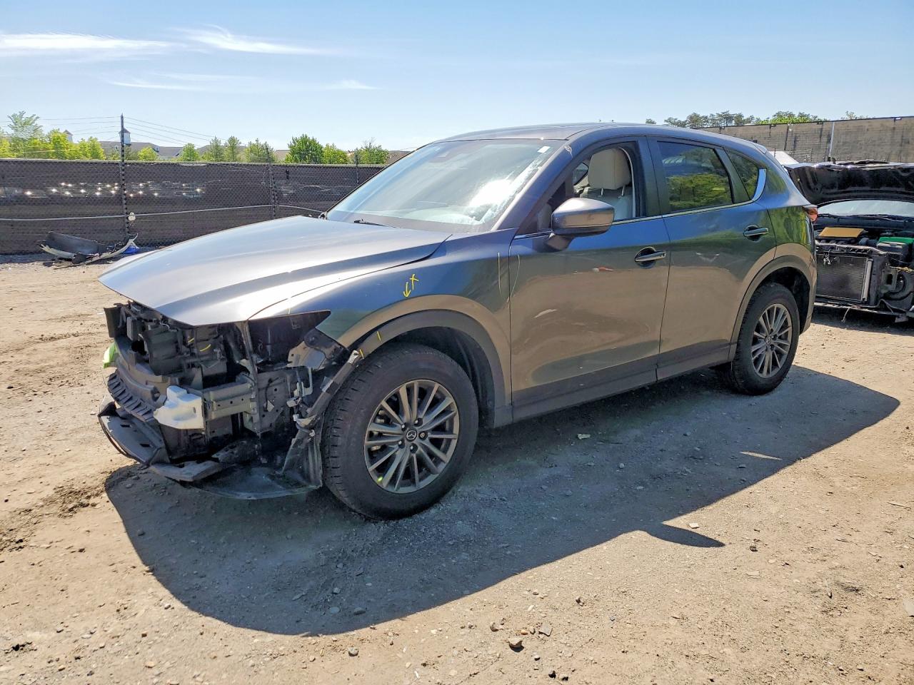 2021 Mazda CX-5 Touring, VIN JM3KFBCM2M0400589 — Front end
