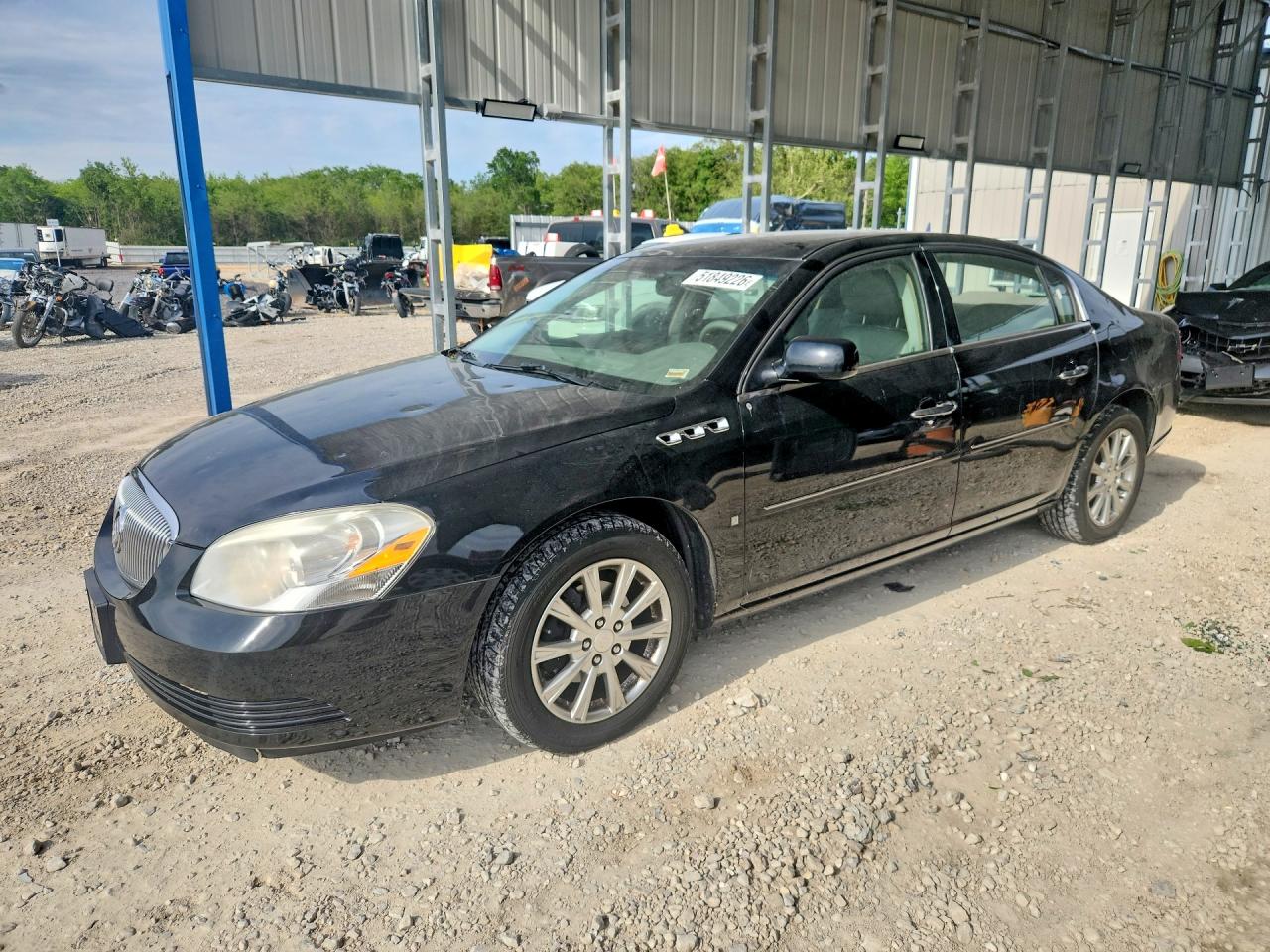 2009 Buick Lucerne CXL, VIN 1G4HD57M09U100971 — Hail