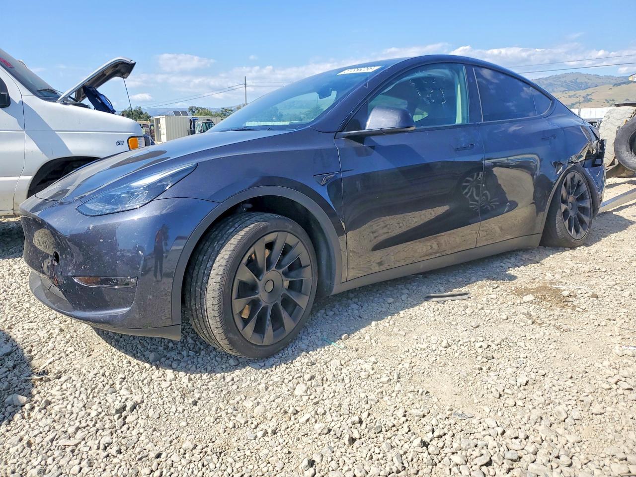 2024 Tesla Model Y Long Range, VIN 7SAYGDEEXRF068446 — Undercarriage