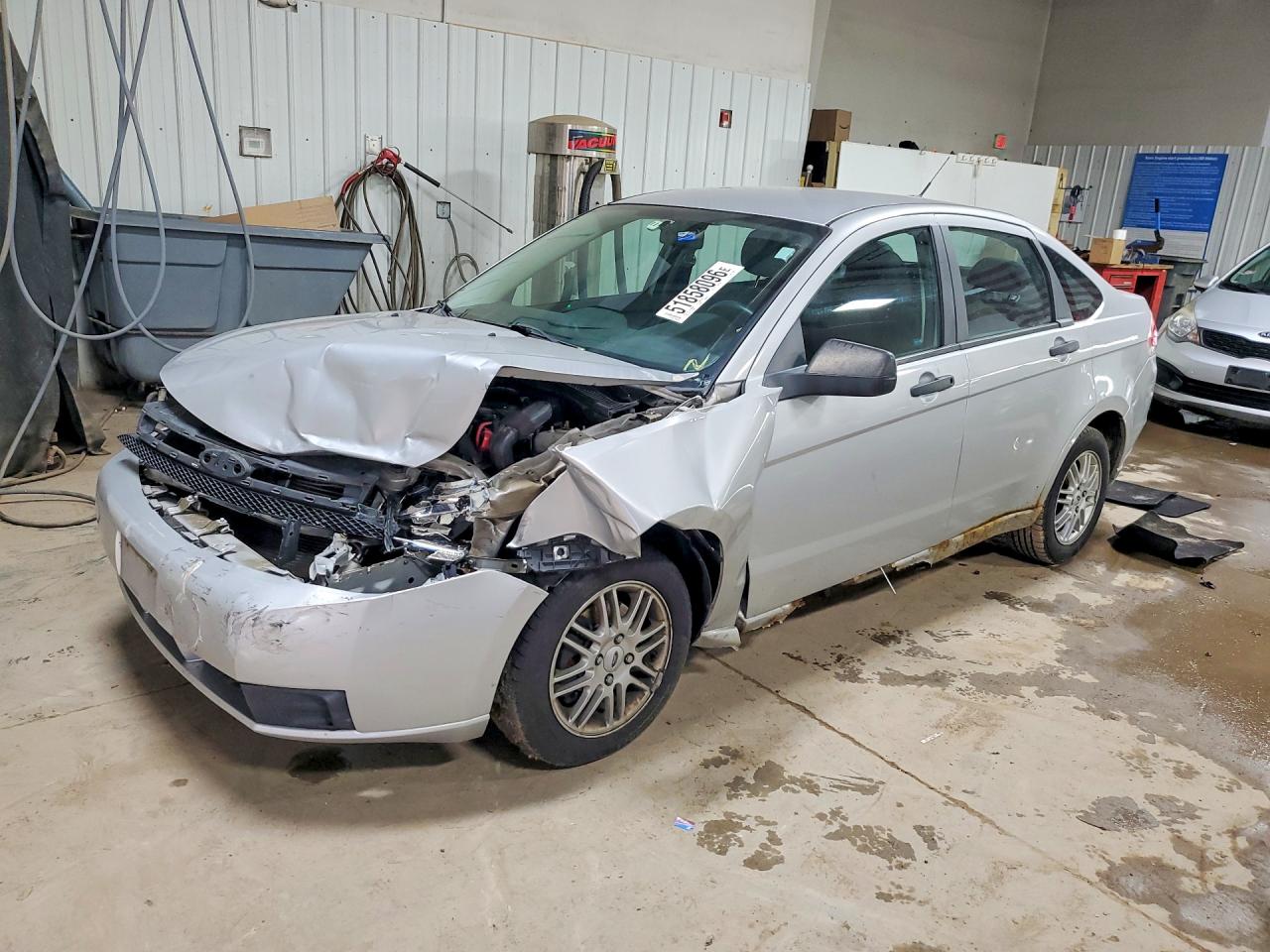 2009 Ford Focus SE, VIN 1FAHP35N59W126648 — Front end