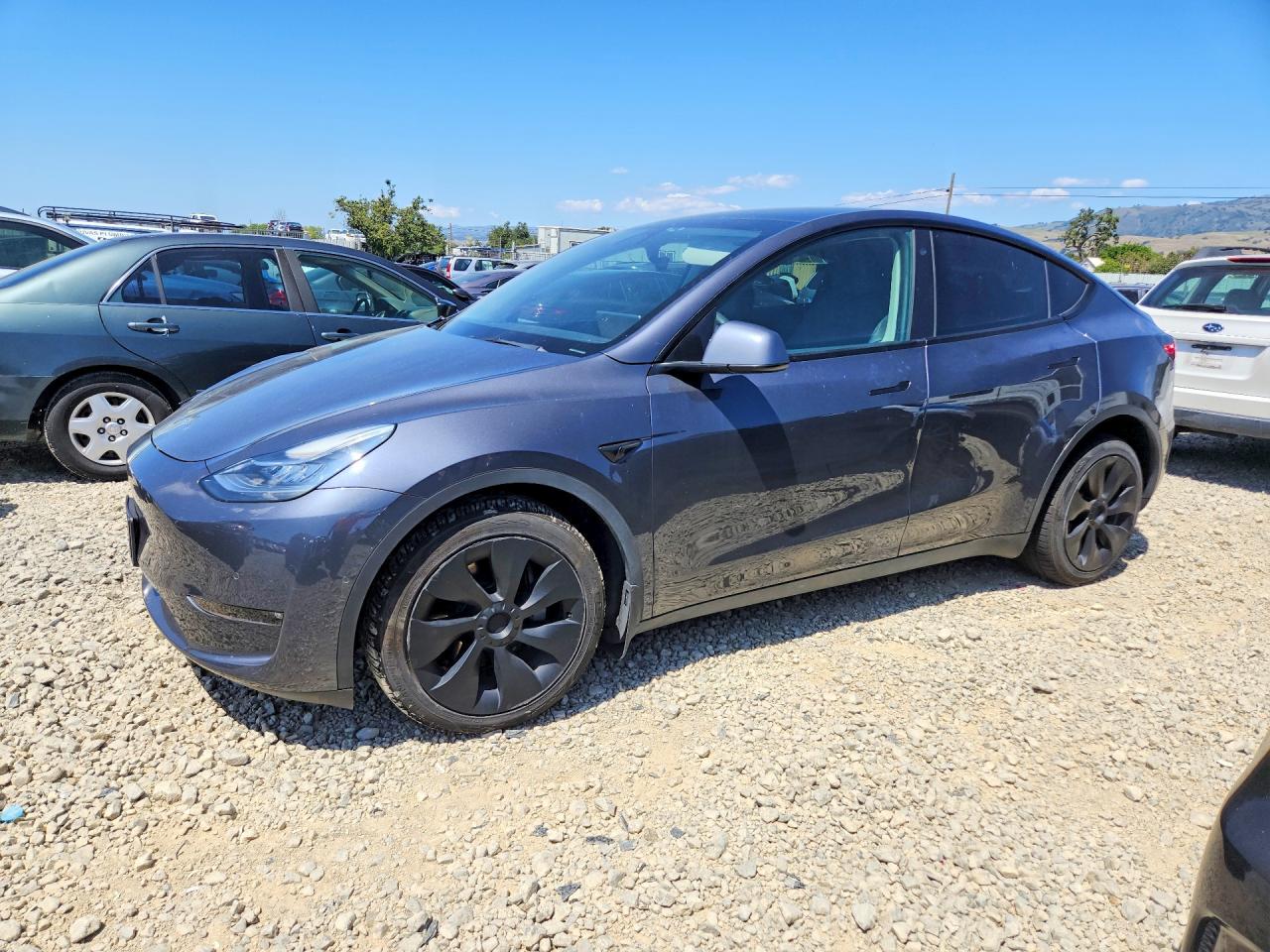 2022 Tesla Model Y Long Range, VIN 7SAYGDEE8NF384583 — Фото с аукциона 1 of 4