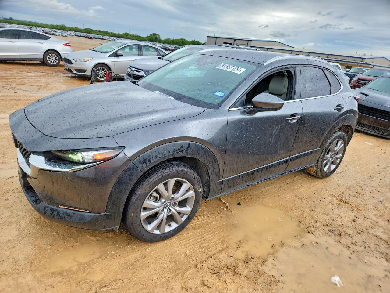 2023 Mazda CX-30 S Carbon Edition, VIN 3MVDMBCM8PM553551 — Side
