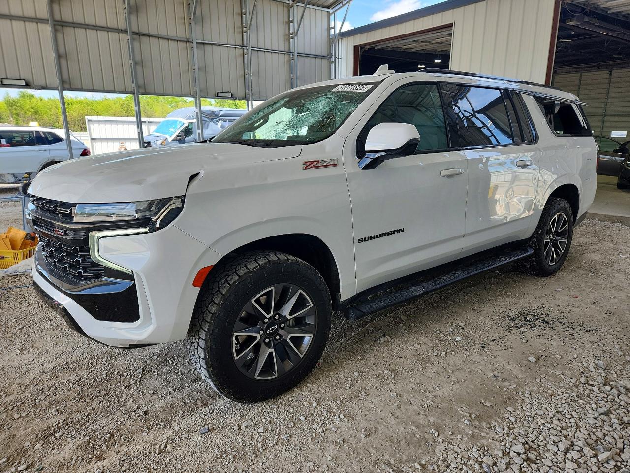 2024 Chevrolet Suburban Z71, VIN 1GNSKDKD6RR297947 — Hail
