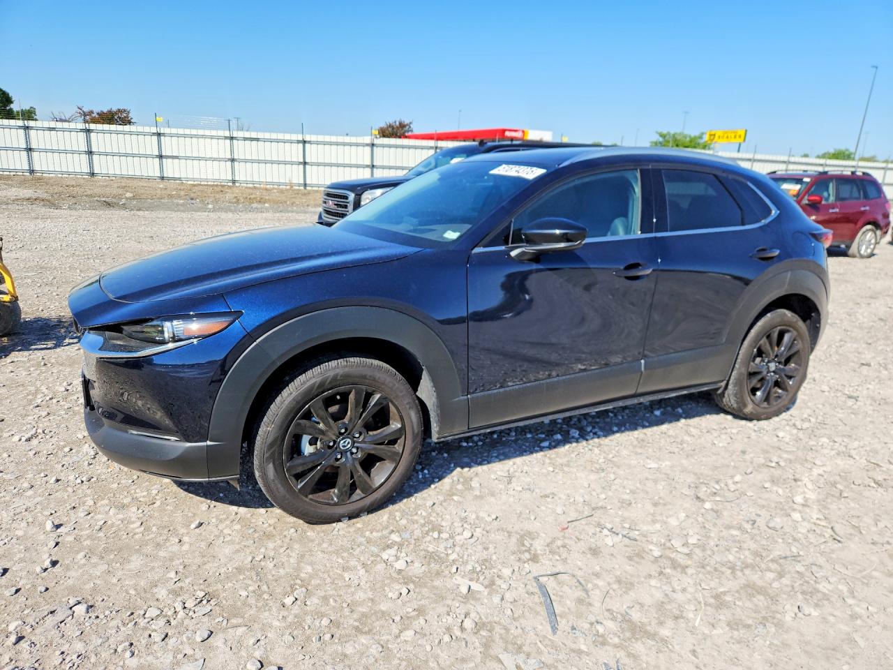 2023 Mazda CX-30 Premium, VIN 3MVDMBDY2PM586238 — Rear end