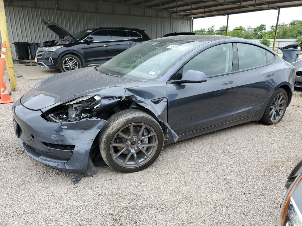 2022 Tesla Model 3 Long Range, VIN 5YJ3E1EB5NF288833 — Front end