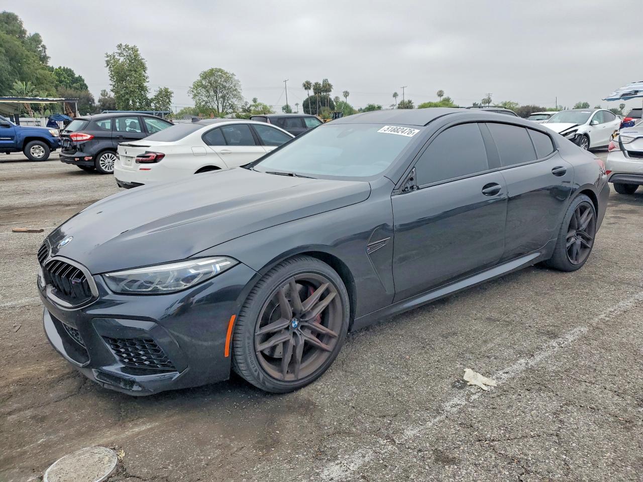 2022 BMW M8 Competition, VIN WBSGV0C02NCG90430 — Бок