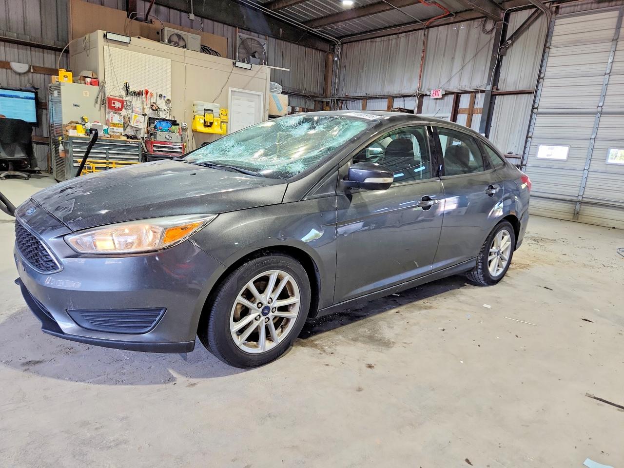 2016 Ford Focus SE, VIN 1FADP3F22GL398852 — Hail