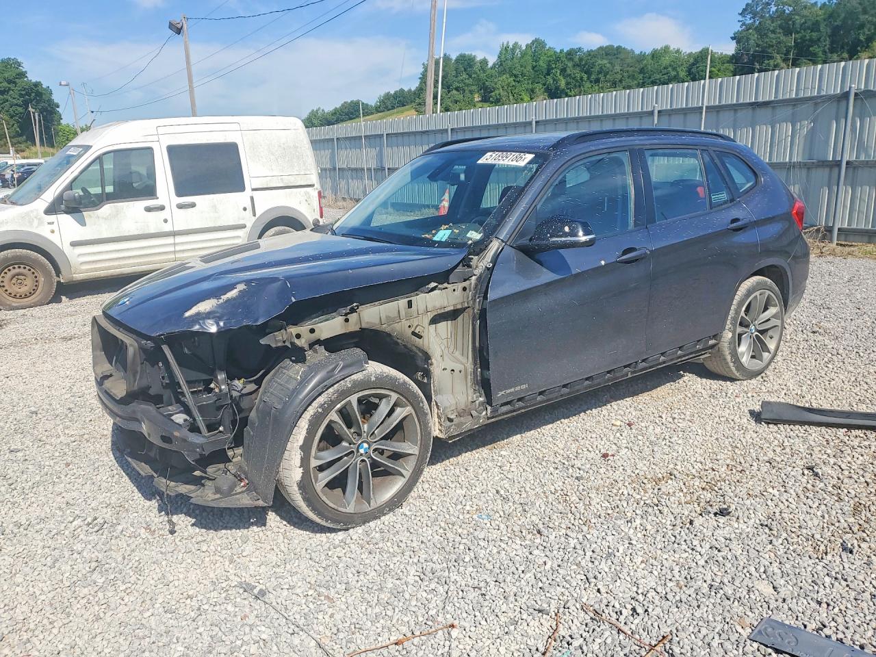 2015 BMW X1 xDrive28i, VIN WBAVL1C55FVY29942 — Front end