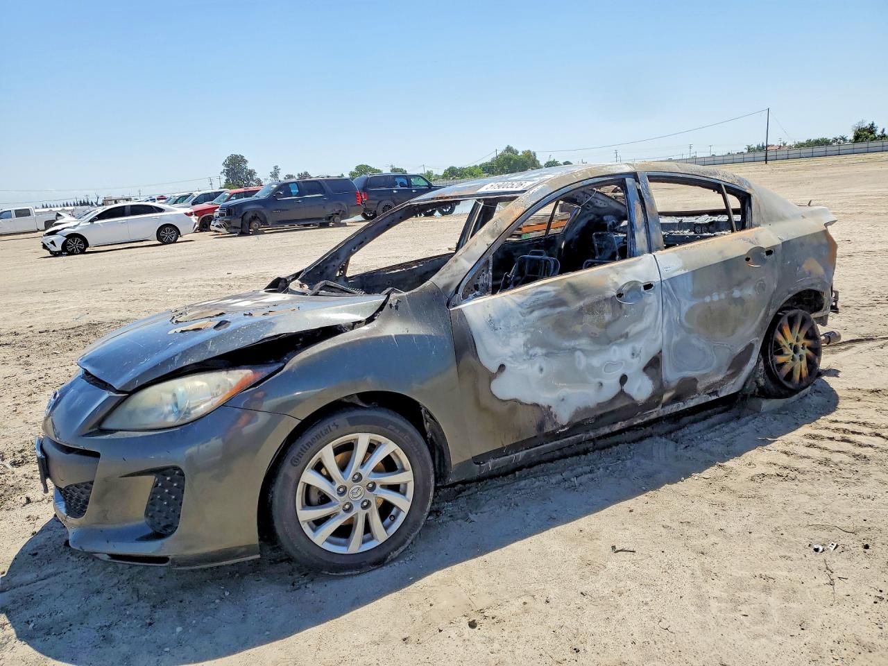 2012 Mazda 3 i Touring, VIN JM1BL1V83C1698283 — Burn