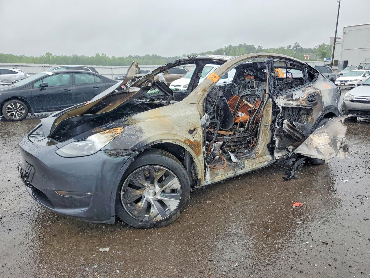 2024 Tesla Model Y Long Range, VIN 7SAYGAEE0RF002504 — Burn