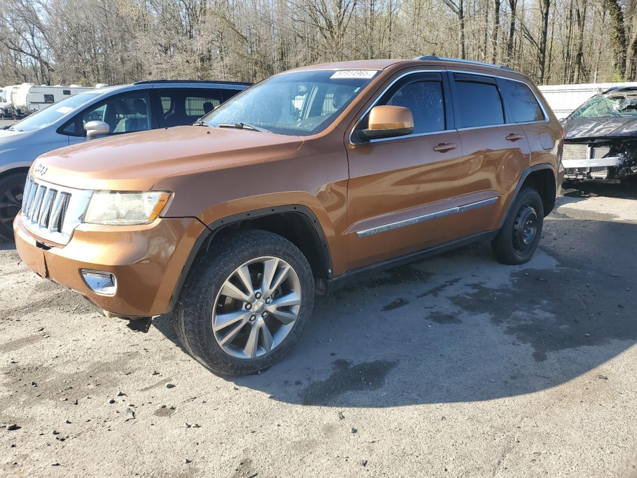 2011 Jeep Grand Cherokee Laredo, VIN 1J4RR4GG1BC666707 — Partial repair
