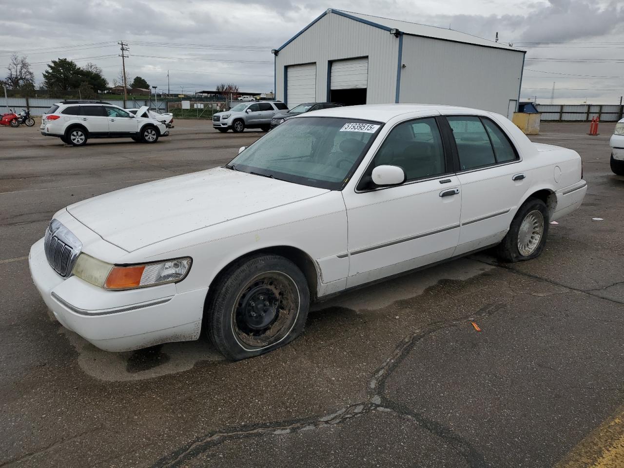 1999 Mercury Grand Marquis LS, VIN 2MEFM75W6XX619412 — Undercarriage