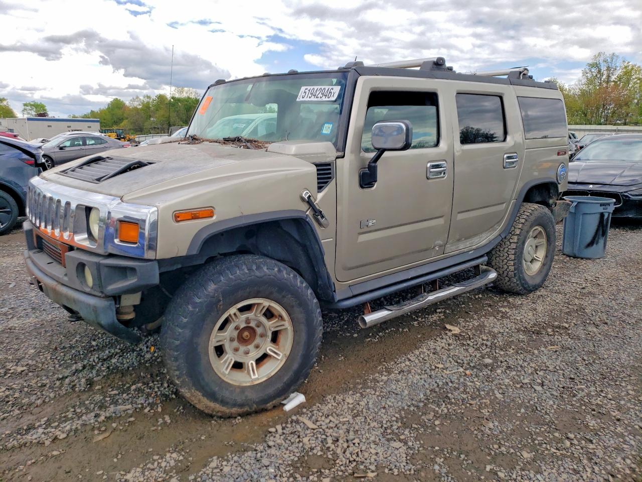 2004 Hummer H2, VIN 5GRGN23U64H118618 — Rear end