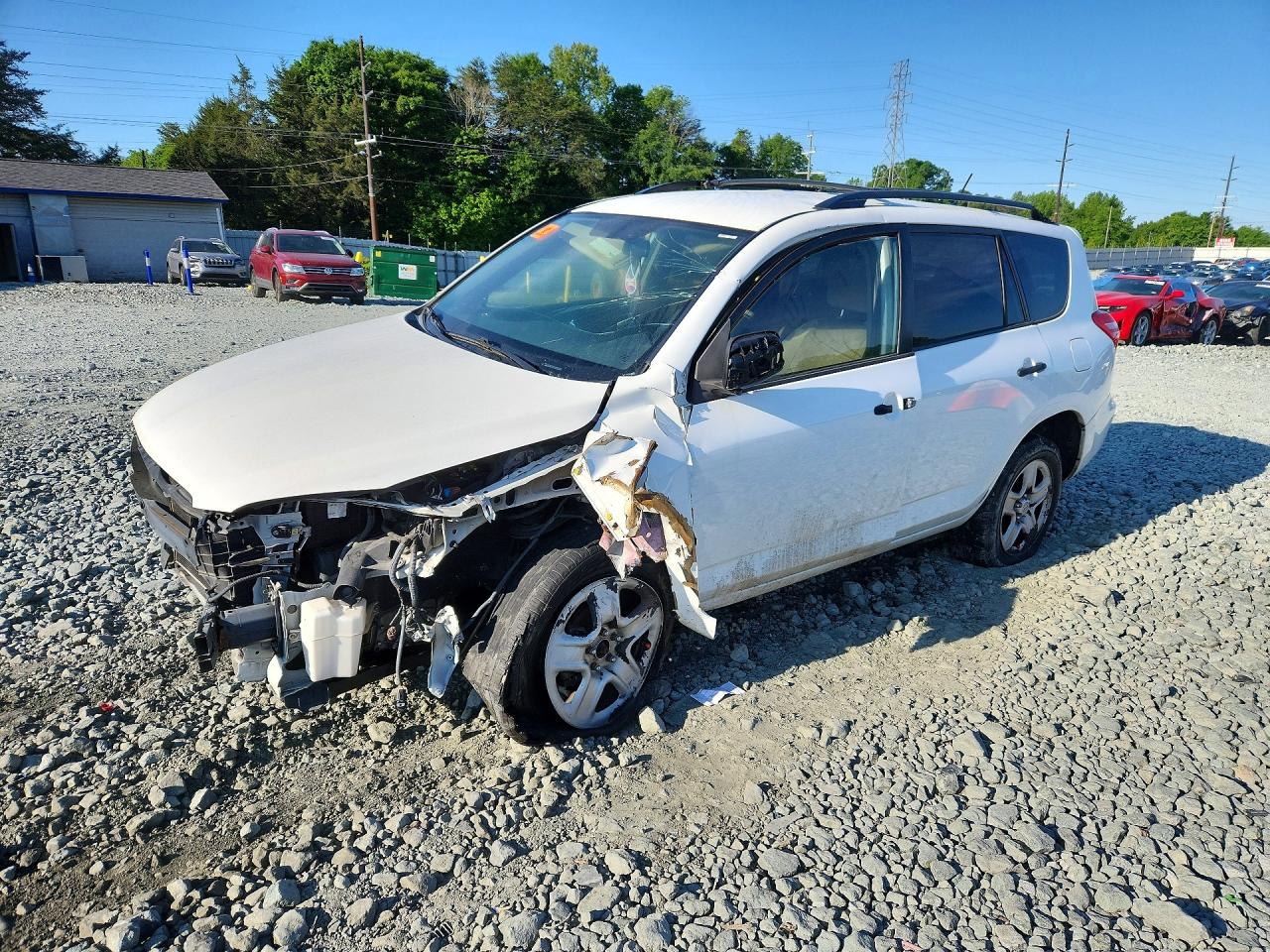 2012 Toyota RAV4, VIN 2T3ZF4DV1CW128718 — Бок
