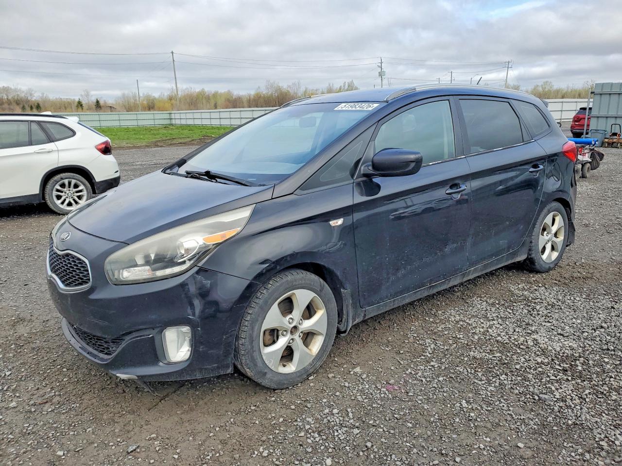 2014 Kia Rondo LX, VIN KNAHT8A30E7059935 — Minor dents and scratches