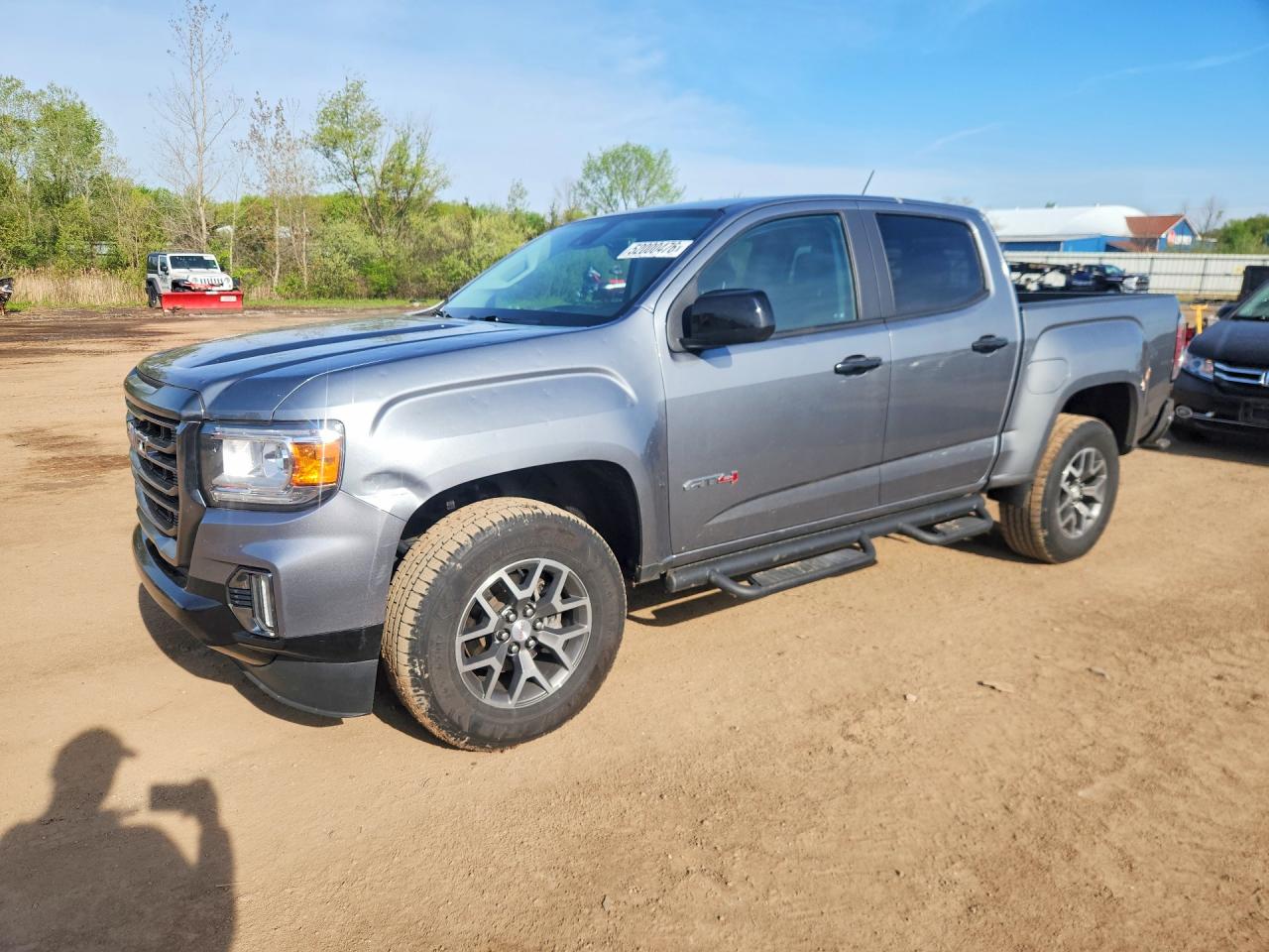 2022 GMC Canyon 4WD AT4, VIN 1GTG6FEN3N1136712 — Hail