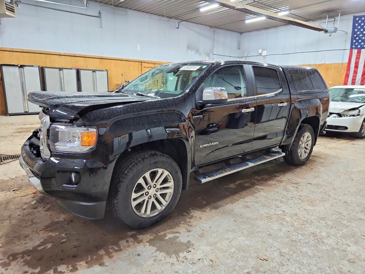 2015 GMC Canyon 4WD SLT, VIN 1GTG6CE31F1251422 — Front end