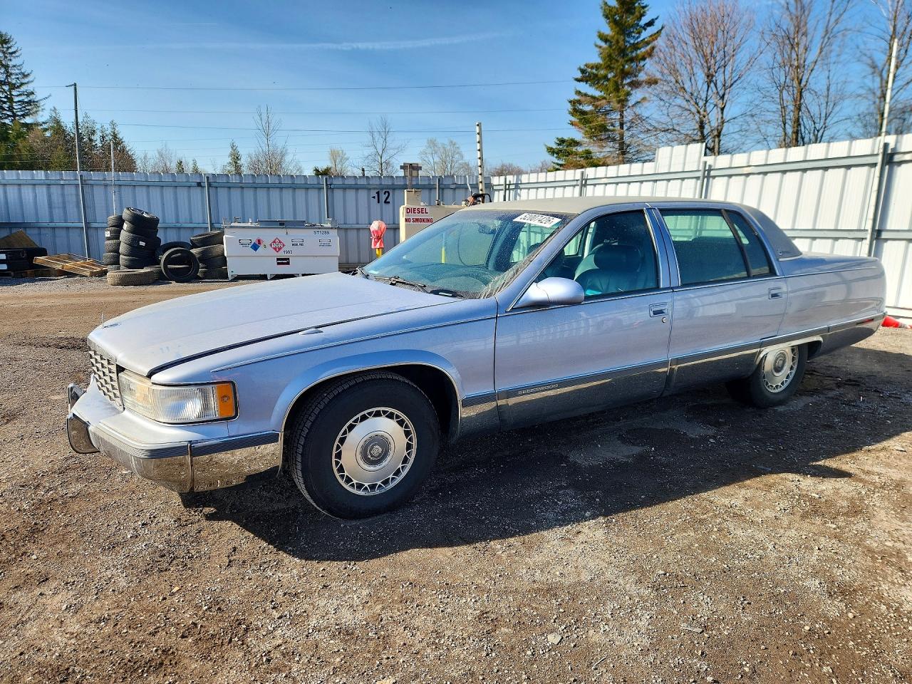 1996 Cadillac Fleetwood, VIN 1G6DW52P2TR704081 — Side