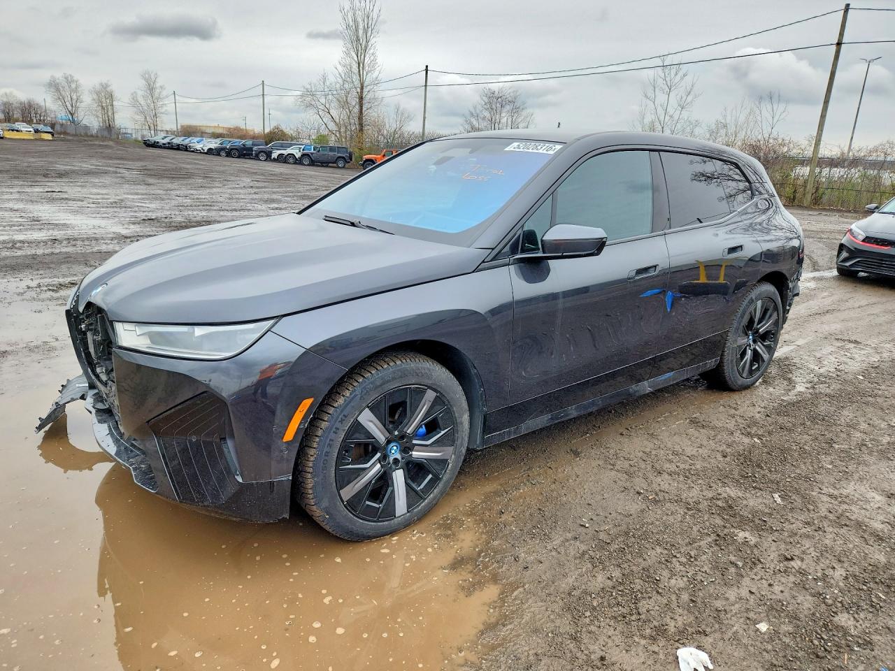 2023 BMW iX, VIN WB513CF06PCL80129 — Бок