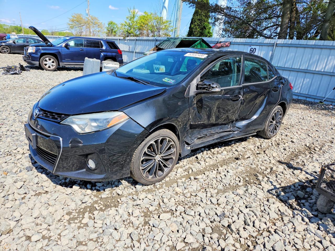 2015 Toyota Corolla L, VIN 2T1BURHE2FC377087 — Side