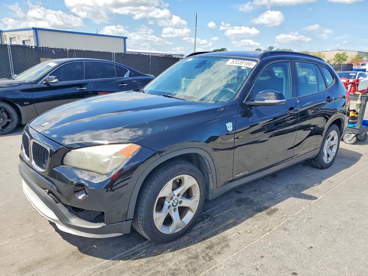 2015 BMW X1 sDrive28i, VIN WBAVM1C52FV314409 — Rear end