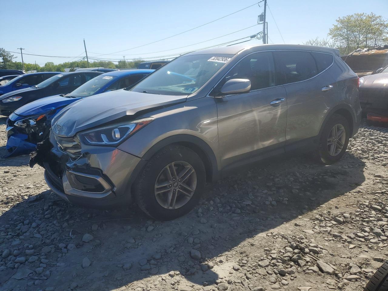 2017 Hyundai Santa Fe 2.4L, VIN 5XYZTDLB0HG383365 — Front end