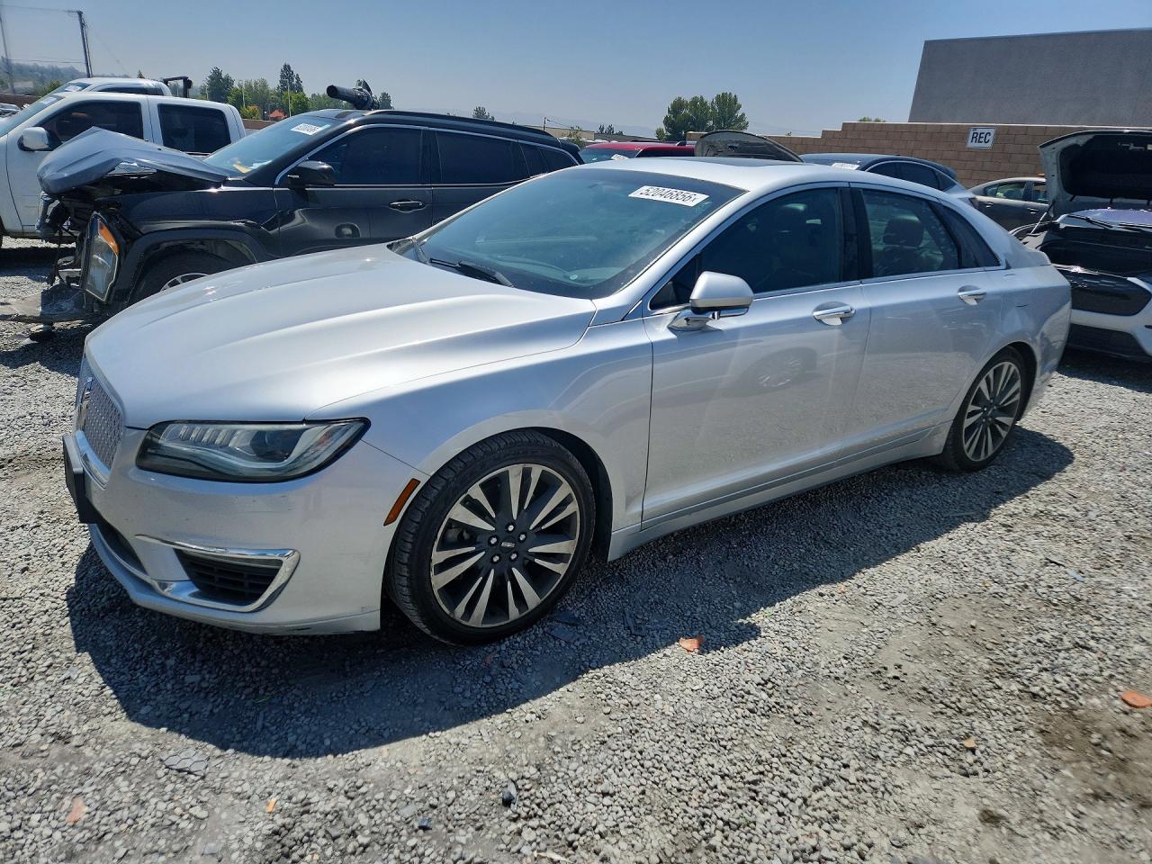 2017 Lincoln MKZ Reserve, VIN 3LN6L5FC5HR613982 — Мелкие вмятины и царапины