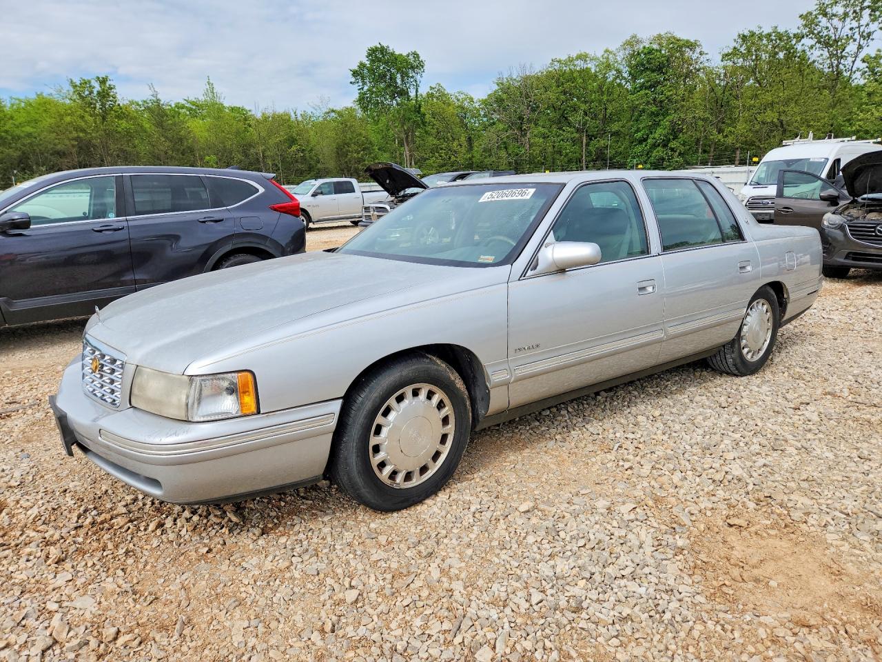 1999 Cadillac DeVille, VIN 1G6KD54Y5XU804083 — Hail