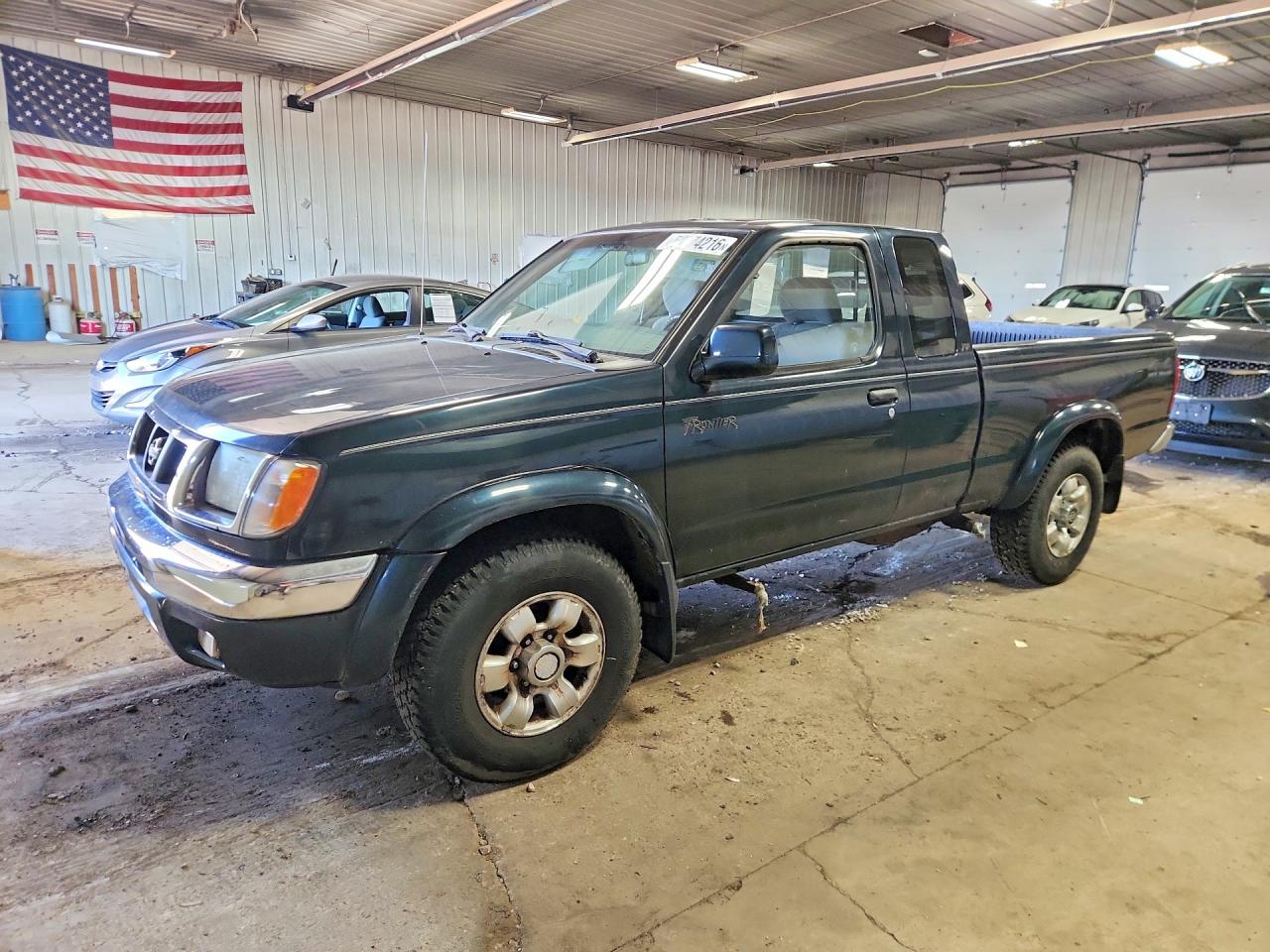 1999 Nissan Frontier XE, VIN 1N6ED26Y6XC335448 — Normal wear