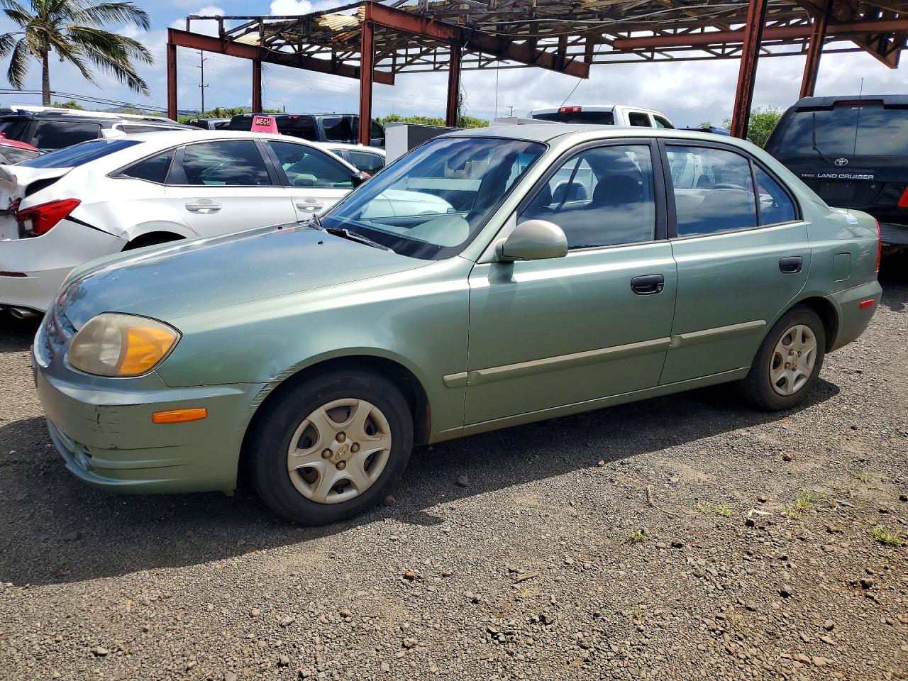 2003 Hyundai Accent GL, VIN KMHCG45C33U429984 — Бок