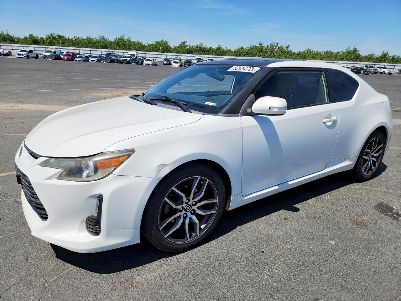 2014 Scion tC, VIN JTKJF5C75E3075719 — Side