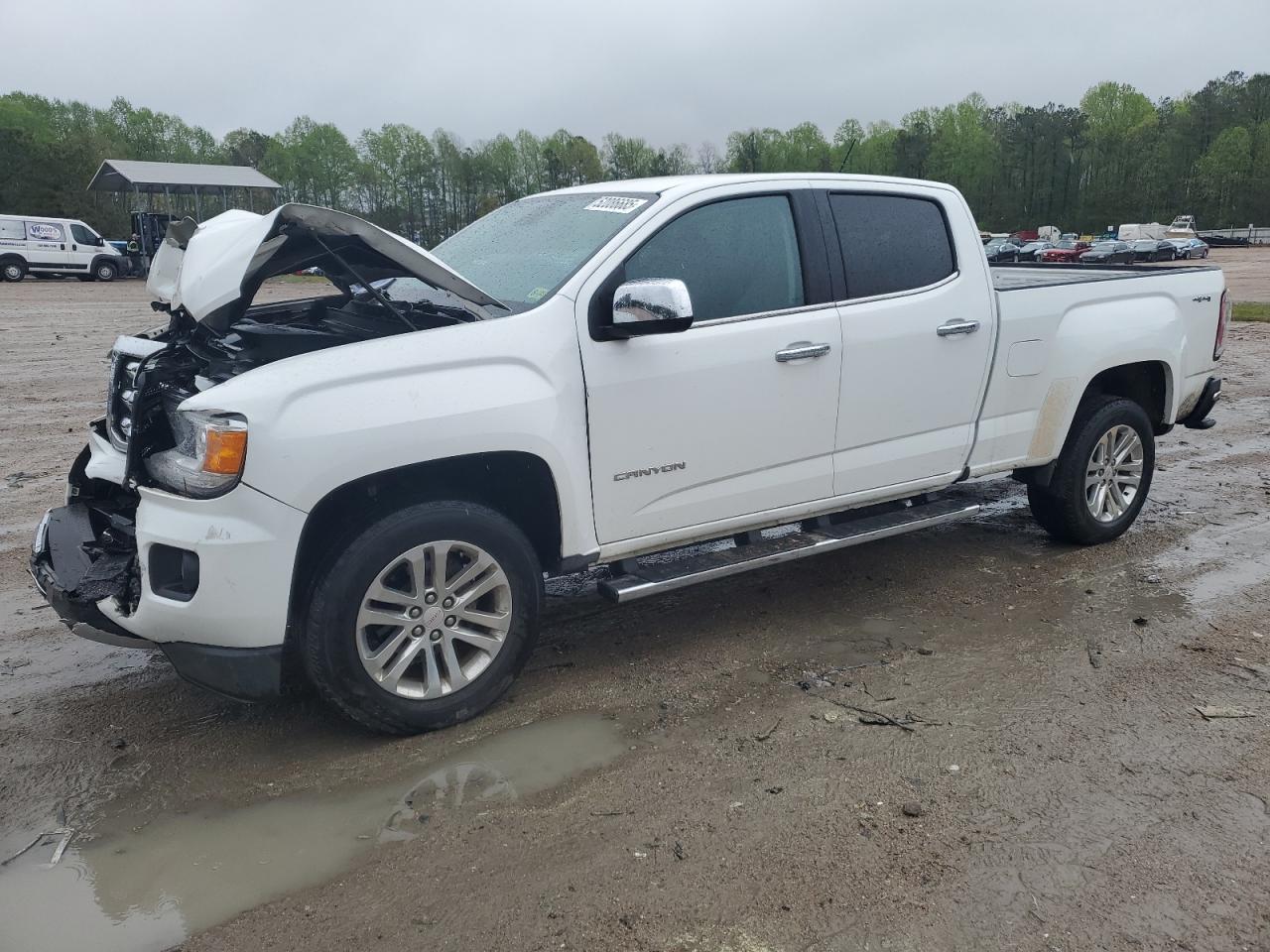 2015 GMC Canyon 4WD SLT, VIN 1GTG6CE30F1132423 — Front end