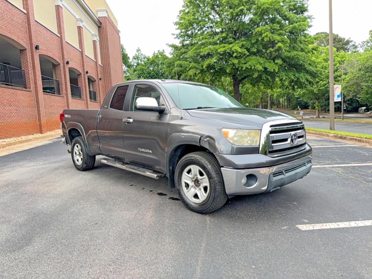 2011 Toyota Tundra, VIN 5TFRM5F16BX025150 — Ранее повреждён
