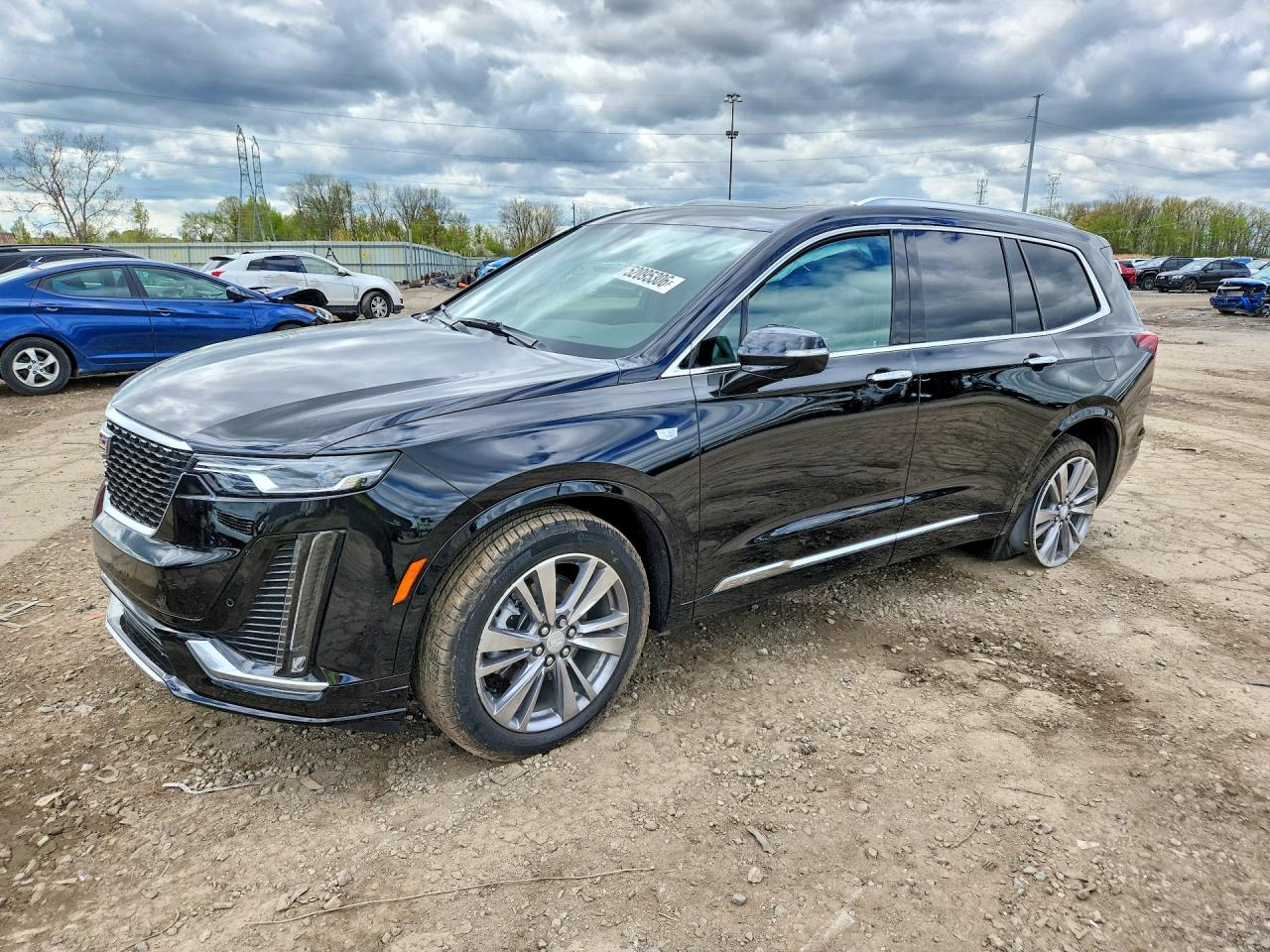 2025 Cadillac XT6 AWD Premium Luxury, VIN 1GYKPDRS9SZ147412 — Side