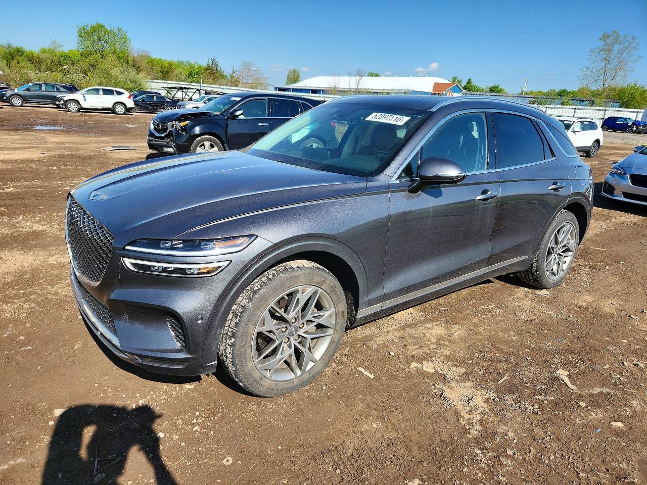2022 Genesis GV70 2.5T, VIN KMUMADTB0NU067231 — Side