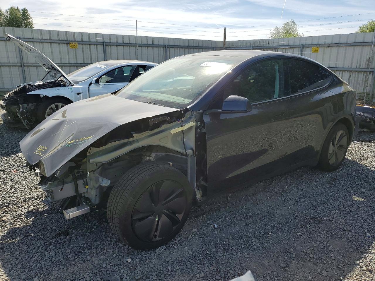 2026 Tesla Model Y Long Range Launch Series, VIN 7SAYGDEE7TF517668 — Front end