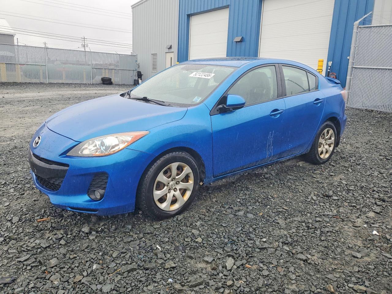 2012 Mazda 3 i Touring, VIN JM1BL1V72C1623811 — Бок