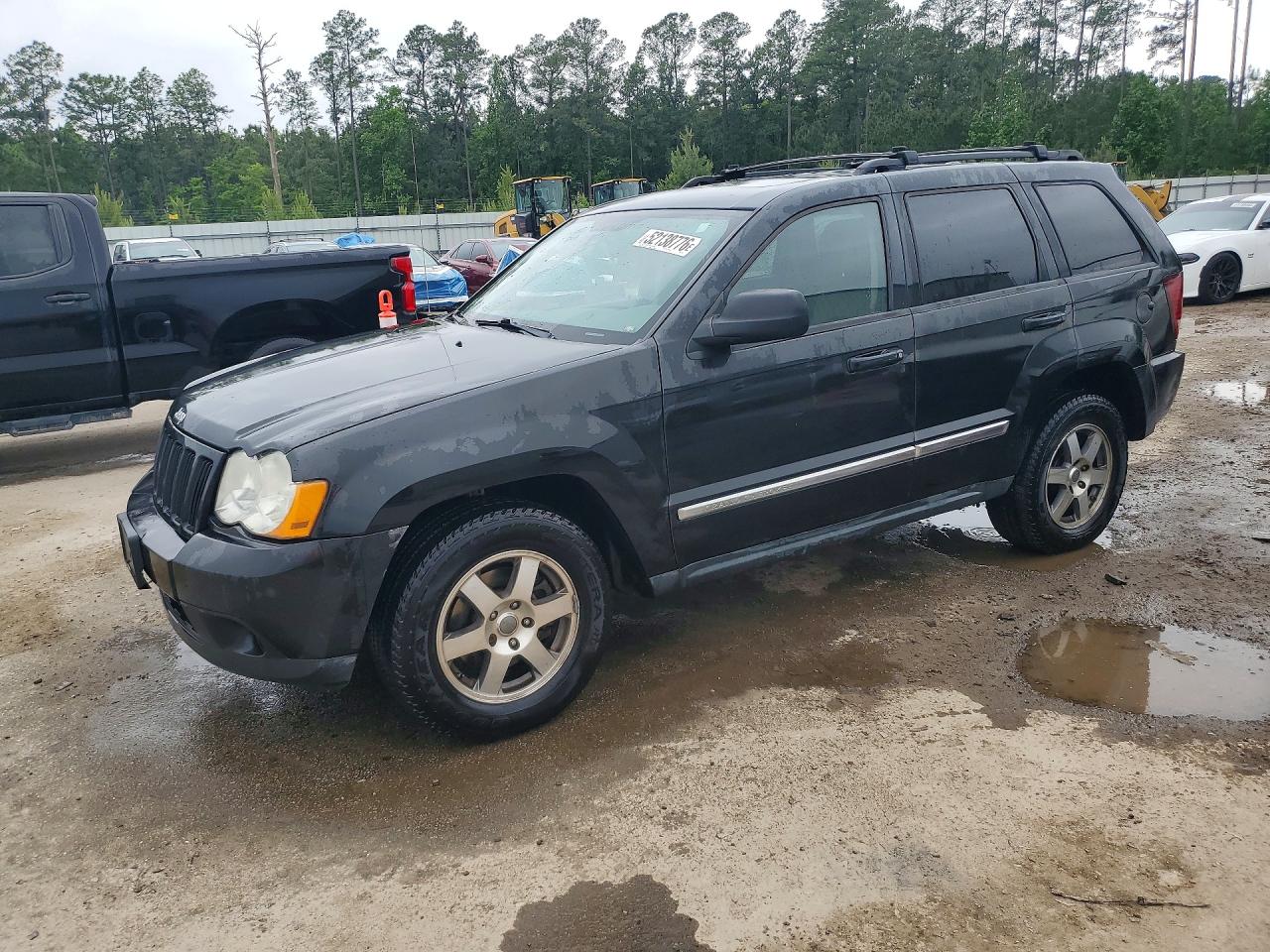2009 Jeep Grand Cherokee Rocky Mountain, VIN 1J8GR48K99C549329 — Minor dents and scratches